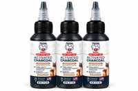 Three identical 60 ml bottles of PetVet Medic activated charcoal pet first aid stand side-by-side against a white background.