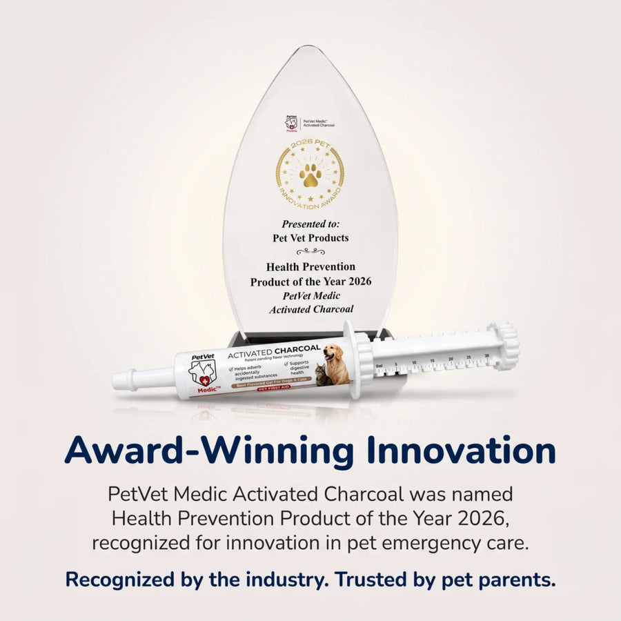 A tear-shaped award for PetVet Medic Activated Charcoal sits behind a pet emergency care syringe labeled as the 2026 Health Prevention Product of the Year.
