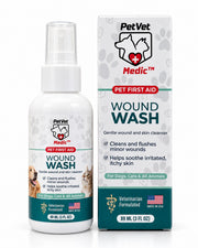 A bottle of PetVet Medic wound wash for dogs and cats stands next to its matching product box.