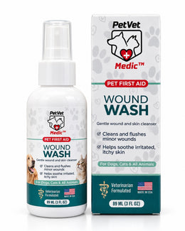 A bottle of PetVet Medic wound wash for dogs and cats stands next to its matching product box.
