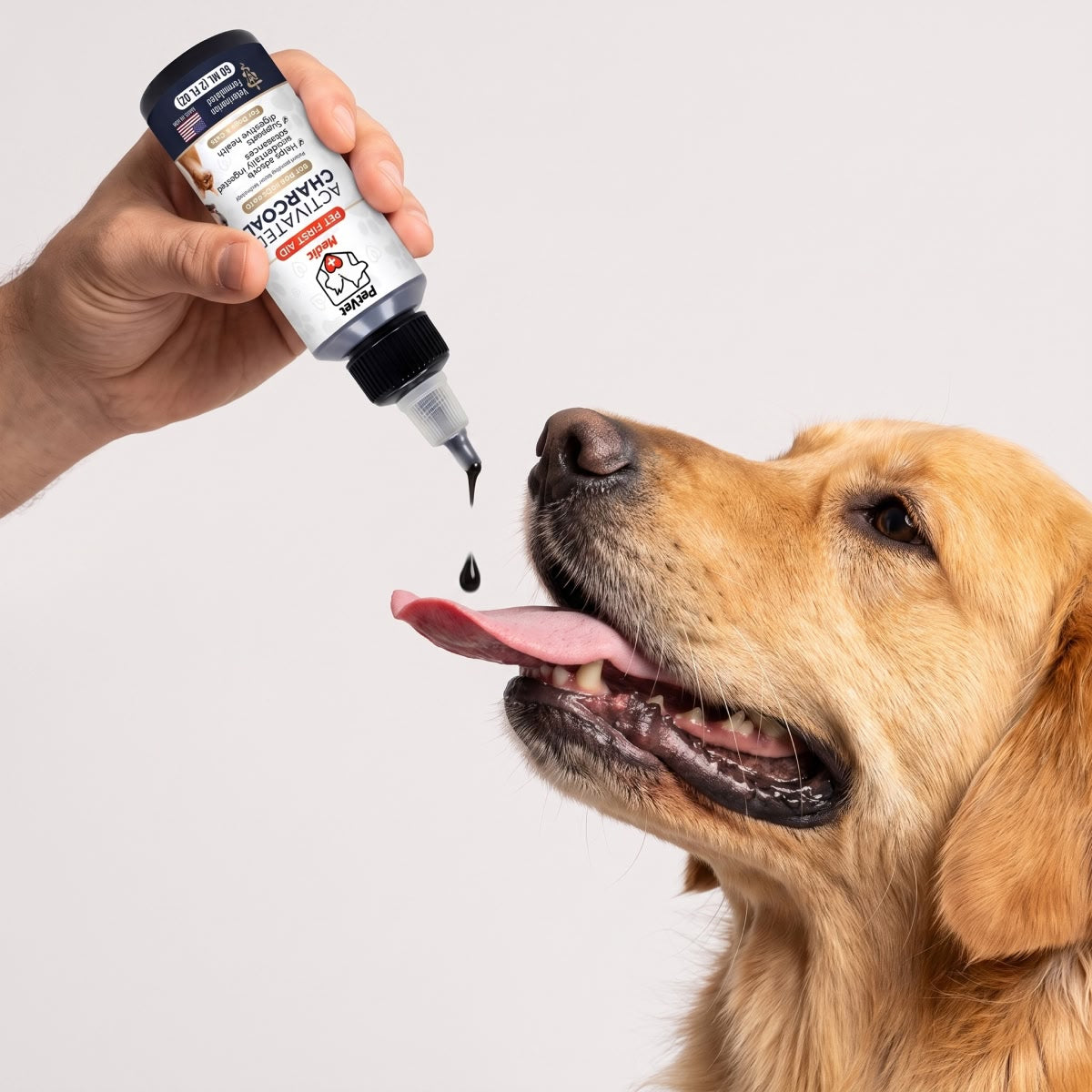 Dog receiving activated charcoal