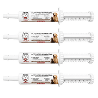 Four identical PetVet Medic activated charcoal pet first aid gel syringes are displayed horizontally against a white background.