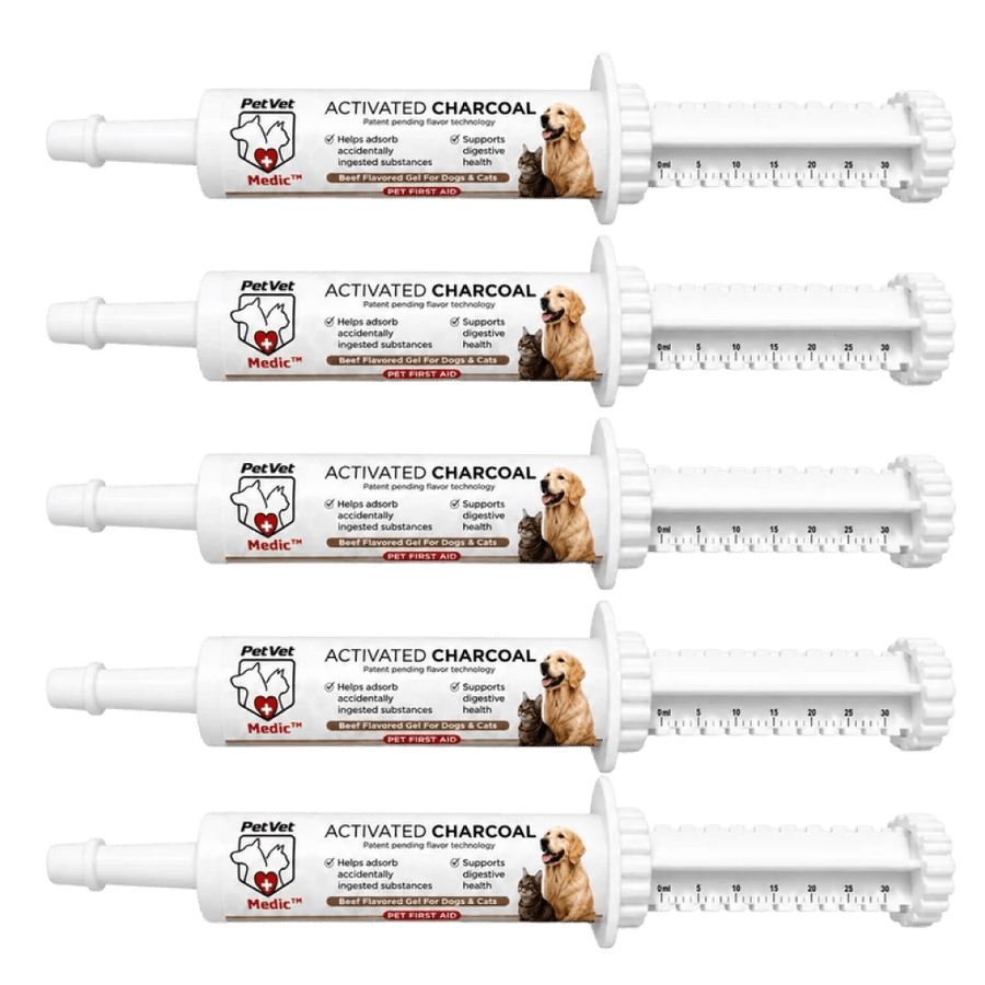 Five PetVet Medic activated charcoal syringes for dogs and cats feature measurement markings and feature photos of a cat and dog on the labels.